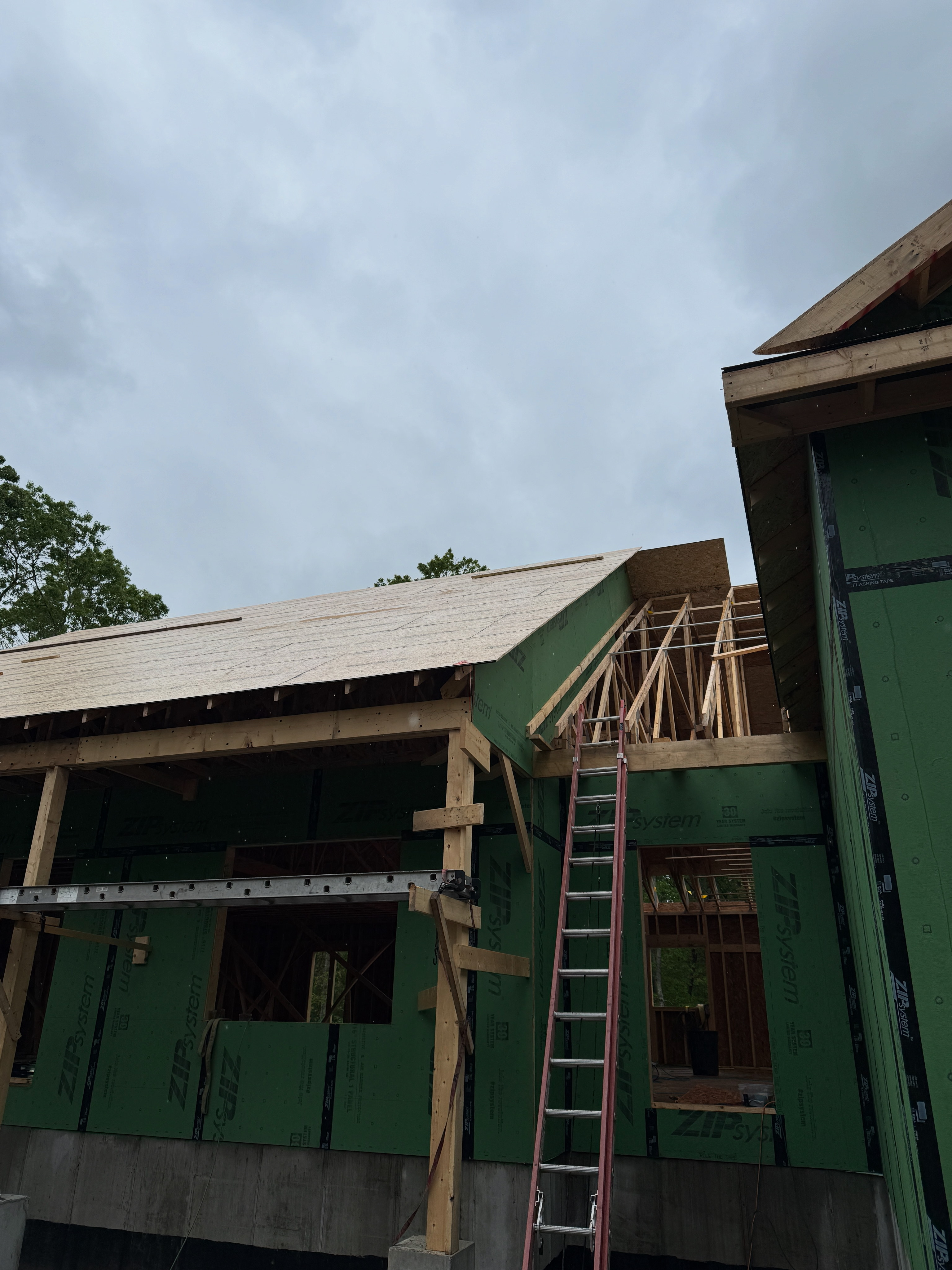 Continued Roof Construction - ZIP System and Framing Work