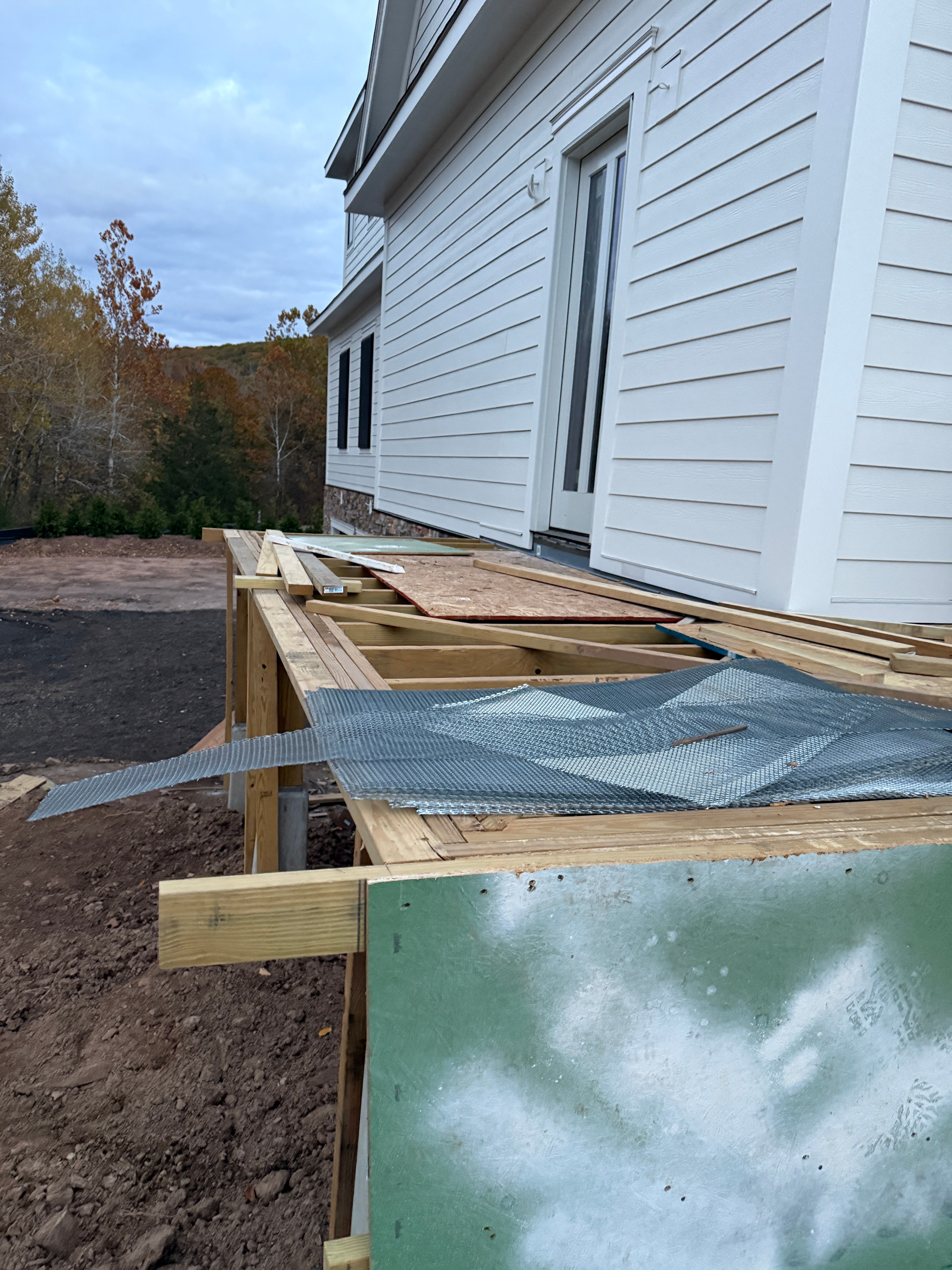 Deck Framing Progress - Waterproofing Membrane and Joist Installation